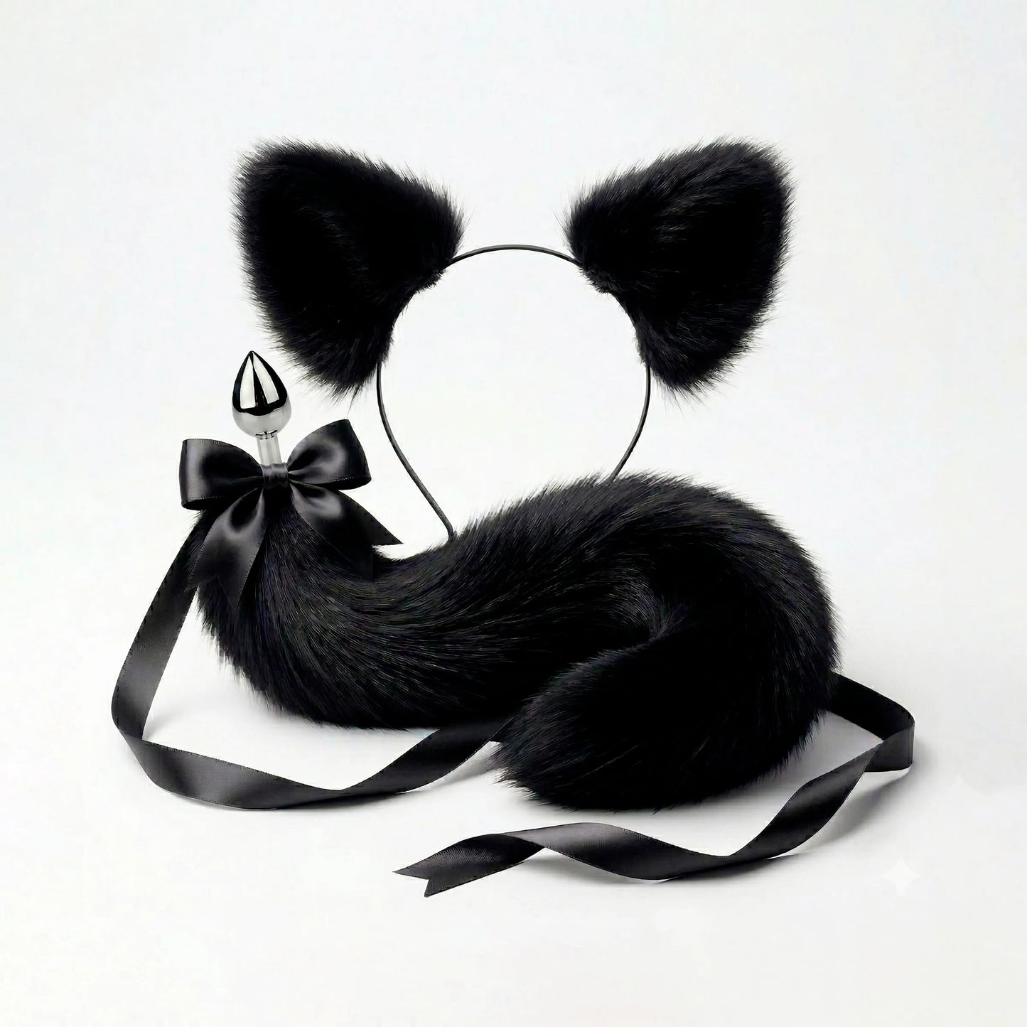 Furry faux fur  black cat tail butt plug and ears with a bow on a white background