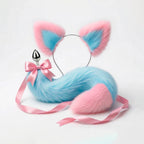 Furry faux fur blue and pink cat tail butt plug and ears with a bow on a white background