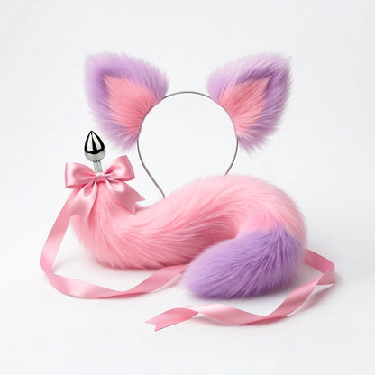 Furry faux fur pink and purple cat tail butt plug and ears with a bow on a white background