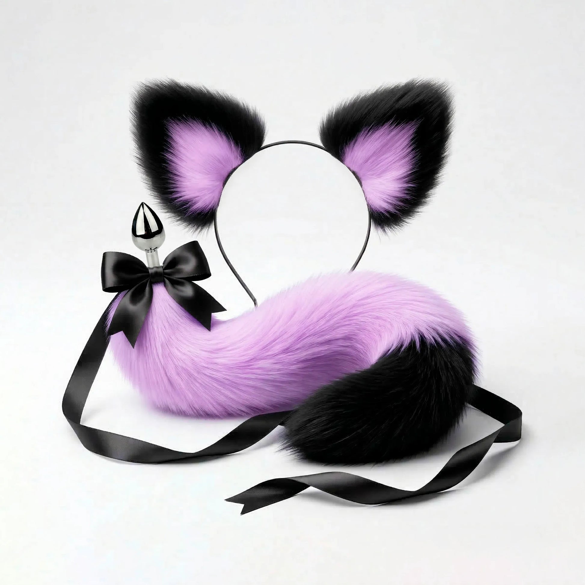 Furry faux fur purple and black cat tail butt plug and ears with a bow on a white background